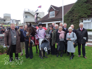 Sound Investment with owners and Nick Scholfield at Sandown - 8 November 2014