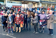 Take Your Time with Owners and jockey Lorcan Williams after winning at Chepstow - 4 December 2021