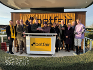 Makin'yourmindup's owners and Harry Cobden at Newbury - 10 February 2024